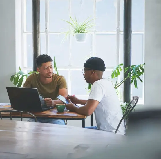 Two people connecting through peer mental health support