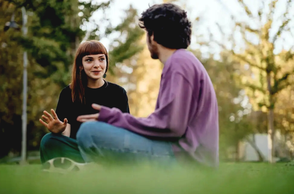 Family having a calmer supportive conversation about recovery