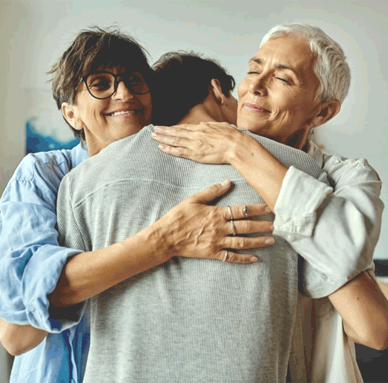 A family embracing in a supportive moment